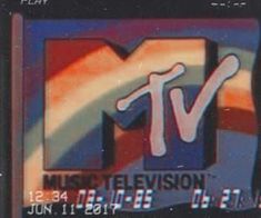 the tv logo has been altered to look like it is being displayed on a card