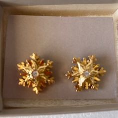 Vintage Avon Glistening Snowflake Gold Tone Pierced Earrings. These Are New In The Box From The 80s It Would Make A Great Addition To Your Christmas Earring Collection. Vintage Gold Jewelry For Holidays, Costume Jewelry Yellow Gold Earrings For Gift, Yellow Gold Costume Jewelry Earrings For Gift, Gold Snowflake Earrings For Gifts, Avon Jewelry Vintage, Aqua Earrings, Earring Collection, Avon Jewelry, Stone Studs