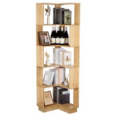 a wooden book shelf filled with lots of books and wine bottles on top of it