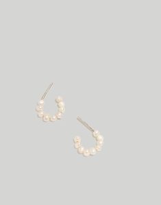 Add instant vintage charm to your lobes with these darling Freshwater Pearl Huggie Hoop Earrings. Tiny pearls nestle cozily inside gold-plated hoops for subtle sparkle perfect for everyday. Stack them on both sides or wear solo for a look that's oh-so-Instagrammable. Lightweight and comfy enough for all-day wear, they're a breeze to pair with everything from bare faces to full glam. String Earrings, Natural Pearl Necklace, Woven Ring, Multiple Piercings, Freshwater Pearl Ring, Pearl Hoop Earrings, Accessories Jewelry Earrings, Huggie Hoop Earrings, Freshwater Pearl Necklaces