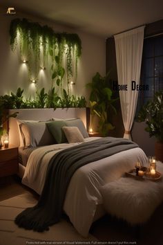 a bedroom with plants and lights on the wall above the bed, along with candles