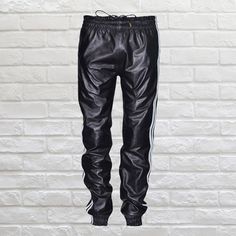 A high-quality genuine leather pant is a must in every men wardrobe. You can find real leather pants for men at Leather Trend at very affordable prices. If you feel a little creative or know exactly what you want, you can even design your own leather pants online @Leather trend , we are all about customization any design of your choice also . We want you to feel at the top of the world whenever you are wearing one of our appealing and stylish leather Pants for men. FEATURES *OUTSIDE MATERIALS: 100% Lambskin Genuine Leather. *INSIDE MATERIALS: Premium Satin linings. *HARDWARE: Hand Polished Metal hardware. FEATURES 1.DO NOT WASH AND TUMBLE DRY OR DRY CLEAN. 2.DO NOT IRON. 3.CLEAN IN PROFESSIONAL LEATHER CARE CENTRE. Urban Style Black Leather Streetwear Pants, Urban Black Leather Pants For Streetwear, Black Urban Leather Pants For Streetwear, Urban Leather Bottoms For Streetwear, Black Leather Streetwear Bottoms, Casual Leather Streetwear Pants, Black Leather Pants For Streetwear, Black Leather Bottoms For Streetwear, Leather Pants For Men