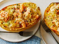 two stuffed squash boats with shrimp and cheese