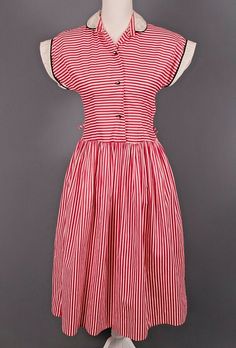 VTG 40s 50s Dress A striped dress from the 1940s-50s era. It is in good vintage condition. One of the armpits appears to have been mended. The collar and cuffs have some discoloration, and there is a small snag on the right hip. There is no size label, but it would fit closest to a contemporary size small. This is a vintage item with a unique cut so please check the measurements before purchasing. Measurements Laying Flat: Bust: 16.5" Waist: 13.75" Hip: Open Sleeve Length: 2.25" Length: 43" This Red Cotton Vintage Dress, Lined 1950s Style Vintage Dress, 1950s Style Lined Vintage Dress, 1950s Style Vintage Dress, Red Vintage Dress For Vintage Events, Vintage Red Dress With Buttons, Vintage Red Dresses With Buttons, Red Vintage Dress With Buttons, Red Vintage Dresses With Buttons