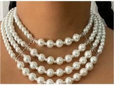 "A timeless reflection of elegance, the white pearl and crystal necklace sparkles like a starry night.  This exquisite white pearl and crystal necklace is an absolute must-have. The perfect combination of glass pearls and crystals sparkle, making it an eye-catching accessory that works with any outfit. Whether you're attending a formal event or just want to look extra special on a night out, this gorgeous piece adds effortless glamour to your ensemble. Make sure you don't miss out on this one-of Formal White Pearl Beaded Necklace, White Pearl Drop Beaded Necklace For Party, White Beaded Necklace With Pearl Charm For Party, White Beaded Pearl Necklace For Formal Occasions, White Pearl Embellished Beaded Necklace For Formal Occasions, White Pearl Beaded Necklaces For Party, Elegant White Crystal Choker Necklaces, Elegant White Crystal Necklace With Pearl Chain, Luxury Beaded Crystal Pearl Necklace