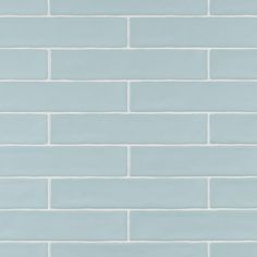 a light blue brick wall with white lines