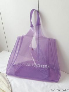 BagForLove - Purple Transparent Beach Tote with Spacious Capacity Product Description Color Mauve Purple Pattern Type Letter Type Shoulder Tote Bag Bag Size Oversized Closure Type Buckle Material PVC Size Chart INCH CM Bag Length Bag Width Bag Height Handle Height 18.1 inch 13.4 inch 5.9 inch 11.8 inch Bag Length Bag Width Bag Height Handle Height 46 cm 34 cm 15 cm 30 cm Details Pictures Similar Products h2 { text-align: center; } /* æ¢è¡ */ li{ white-space: normal; word-break: break-all; word-wrap: break-word; } .red-box { width: 100%; display: flex; flex-direction: row; flex-wrap: wrap; justify-content: center; } .red-box > div { width: 190px; height: 250px; margin: 10px; } .red-box > div > a > img { width: 190px; height: 250px; } .size-box { width: 100%; margin: auto; white-space: now Summer Large Capacity Clear Shoulder Bag, Summer Beach Shoulder Bag With Clear Strap, Large Capacity Clear Shoulder Bag For Summer, Trendy Beach Bag With Clear Strap, Trendy Beach Bags With Clear Strap, Trendy Clear Shoulder Bag For Beach, Trendy Clear Shoulder Bag For The Beach, Clear Shoulder Bag For Beach, Casual Clear Beach Bag