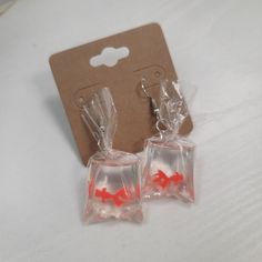 Check Out These Cool Goldfish In A Bag Earrings. Plastic And Measures Approx 1.75 Inch Goldfish In A Bag, Cushion Earrings, Glam Earrings, Brown Earrings, Mermaid Earrings, Christmas Tree Earrings, Fun Jewelry, Solid Gold Earrings, Earring Tree