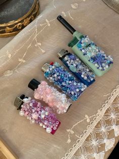 three different types of soaps sitting on top of a lace covered table cloth next to an ornate doily