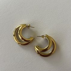 Transform your look with our Double Hoop Earrings! These stunning earrings feature not one, but two hoops for a unique and stylish look. Elevate any outfit with the added dimension and sophistication of our double hoops. Perfect for any occasion and a must-have in your jewelry collection! 18k Gold Plated over Stainless Steel Hypoallergenic Water & Tarnish Resistant All SALE items are FINAL sale Double Hoop Earring, Brazilian Gold, Double Hoop Earrings, Wedding Jewellery Collection, Sunglass Chain, Jewelry Studio, Stunning Earrings, Original Gift, Cz Stone