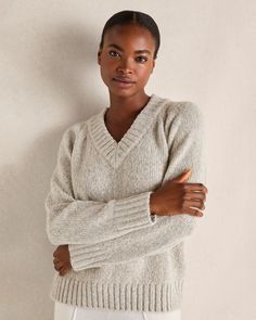 A chunky V-Neck meets the allure of yarn with a subtle shimmer. Style it with your favorite lounge pants and relax. Details + Design: Long sleeve. V-Neck. Hits at hip. Ribbing at neck, hem, and cuffs. Length: 23".Material: 70% Recycled Polyester, 17% Acrylic, 7% Metallic, 3% Wool, 3% Other FiberCare: Machine Wash; Reshape, Lay Flat to Dry, Warm Iron if Needed Imported | Shimmer V-Neck Sweater Haven Well Within Lounge Pants, V Neck Sweater, Vneck Sweater, Lay Flat, Neck Sweater, Design Details, Overalls, Lounge, Yarn