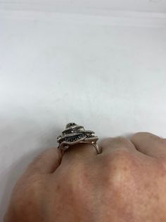 Vintage ring surrounded by Swiss cut fine Marcasite Sterling silver Size 6 can be sized by my jeweler. His service charge is $10-$20 All rings are shipped in a nice gift box. Check out our over a THOUSAND great reviews Engraving is $4 per letter and is not always perfect depending on the piece. It can take a few days if the jeweler is busy. This is payable to Paypal Judithsltd@gmail.com Silver Spiral Fine Jewelry, Anniversary Wire Wrapped Open Ring, Spiral Silver Jewelry For Anniversary, Handmade Spiral Rings For Anniversary, Silver Spiral Jewelry For Anniversary, Unique Silver Cluster Promise Ring, Unique Silver Cluster Ring For Promise, Handmade Spiral Anniversary Rings, Sterling Silver Crystal Ring Stamped 925 Gift