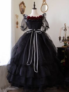 OP will come with nine rose brooches pin on the dress. Puff semi sheer short sleeves, removable roses pin on the neckline and on the skirt, white trimmed black sash. Shirring back, large size options make the dress plus size friendly.  Full set includes the rosette long black dress, a floral and beads chain bow train, a long black veil, a white floral KC, and a FREE petticoat.   	 		 			Size 			S 			M 			L 			XL 			XXL 			XXXL 			XXXXL 		 		 			Bust 			90 			96 			102 			110 			117 			122 			126 Black Rose Design, Black Sash, One Piece Full, Beads Chain, Black Veil, Skirt White, Prom Night, Long Black Dress, Lolita Dress