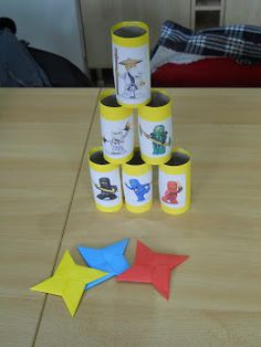 some paper stars are sitting on a table