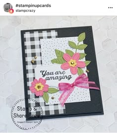 a close up of a card with flowers on it