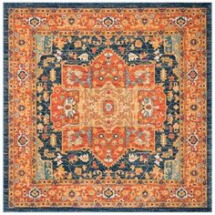 an orange, blue and yellow rug with floral designs on the center is featured in this image