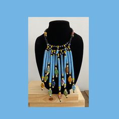 Elevate your wardrobe with this exquisite heishi vinyl disc necklace, expertly strung with Krobo and brass bead accents. Perfect for adding a touch of sophistication to any outfit. Vinyl Disc, Disc Necklace, African Jewelry, June 15, Beaded Necklaces, Bead Necklace, Beaded Jewelry, Beaded Necklace, Necklaces