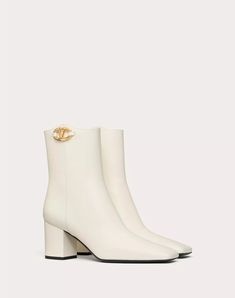 Vlogo The Bold Edition Ankle Boot In Calfskin 70mm for Woman Luxury Cream Ankle Heeled Boots, Chic Cream Pointed Toe Mid-calf Boots, Elegant White Mid-calf Boots With Pointed Toe, White Faux Leather Pointed Toe Mid-calf Boots, White Mid-calf Boots With Stacked Heel And Pointed Toe, Small Leather Goods