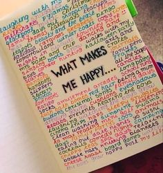 a notebook with writing on it that says what makes me happy