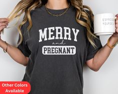 Express shipping available ONLY on White Bella Canvas shirts.  Christmas Pregnancy Announcement Shirt Merry And Pregnant Comfort Colors Shirt Christmas Pregnancy Shirt Baby Announcement Maternity Shirt Celebrate the anticipation and excitement of your pregnancy reveal with our Merry and Pregnant Shirt. This T-shirt adds a touch of cheer to your special moment. Made with comfort in mind, this shirt is crafted with high-quality that ensure a soft and cozy fit. ★Ready to Order? -Select the number o Christmas Pregnancy Announcement Shirt, Christmas Maternity Shirt, Pregnant Shirt, Christmas Pregnancy Announcement, Christmas Pregnancy, Pregnancy Announcement Shirt, Custom Made Shirts, Maternity Shirt, Pregnancy Reveal