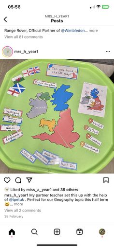 a green plate with some stickers on it and an image of the united kingdom