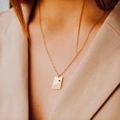 ELEGANT ENGRAVED RECTANGLE NECKLACE Latest trend and add to our contemporary collection this elegant engraved rectangle necklace. A sophisticated, delicate profile holds a unique meaning: up to four names engraved with a heart. An extraordinary gift to treat somebody you love. CHARACTER LIMIT Max 10 letters per name ITEM SPECIFICATIONS • Finish: 18K Gold ∙ 925 Sterling Silver ∙ Rose Gold• Dimensions: Adjustable Length Chain 15” | Pendant 12x18mm Elegant Engraved Charm Necklace With Rectangular Pendant, Elegant Engraved Charm Necklaces With Rectangular Pendant, Elegant Personalized Necklace With Rectangular Pendant, Elegant Rectangular Bar Necklace As Gift, Modern Personalized Rectangular Necklaces, Elegant Rectangular Bar Necklace For Gift, Elegant Rectangular Bar Necklace Gift, Elegant Engraved Charm Necklace With Square Pendant, Elegant Engraved Charm Necklaces With Square Pendant