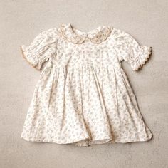 Organic Baby Clothing - Whimsical Jolie Bébé Baby Collection by Viverano Embroidered Cotton Dress With Doll Collar, Cotton Embroidered Dress With Doll Collar, Embroidered Cotton Dress With Peter Pan Collar, Cotton Dress With Ruffled Collar For Garden Party, Spring Dresses With Embroidered Peter Pan Collar, Spring Dresses With Peter Pan Collar And Embroidery, Cotton Dresses With Lace Trim And Ruffled Collar, Cotton Baptism Dress With Lace Collar, Cotton Dress With Peter Pan Collar For Garden Party