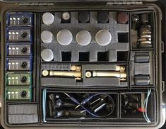 an open case filled with different types of electronic equipment