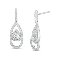 Surprise her with a thoughtful look that reflects your bond - these You Me Us 1 ct. t.w. diamond interlocking teardrops earrings. Fashioned in cool 10K white gold Each linear drop showcases diamonds lining a pair of interlocked open teardrop shapes - representing the shared bond between you and the one you love. Sparkling at the center, a 1/10 ct. diamond signifies your union. The linear bar post also shimmers with diamonds. These 1 ct. t.w. diamond earrings secure comfortably with friction back Teardrop Diamond Earrings With Vvs Clarity For Formal Events, Teardrop Diamond Bridal Earrings In Diamond White, Diamond White Drop Diamond Earrings, Drop Diamond Earrings With Pave Setting For Formal Events, Formal Teardrop Diamond Earrings, Teardrop Vvs Clarity Diamond Earrings In White Gold, Teardrop White Gold Diamond Earrings With Vvs Clarity, Timeless Teardrop Brilliant Cut Diamond Earrings, White Gold Teardrop Diamond Earrings With Vvs Clarity