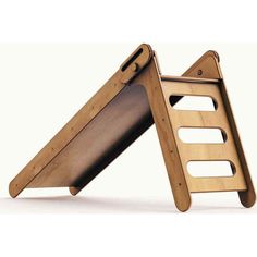 a wooden folding chair with two pieces of wood attached to it