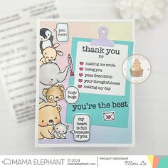 a close up of a card with animals on it and a thank you note in the background