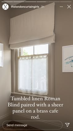 an image of a window with the words tumbled linen roman blind paired with a sheer panel on a brass cafe rod