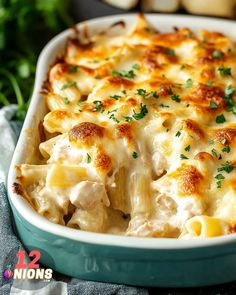 a casserole dish filled with chicken and cheese