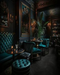 a room filled with lots of blue velvet furniture next to a tall potted plant