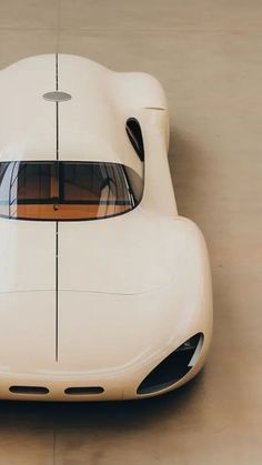 a white sports car is shown from above