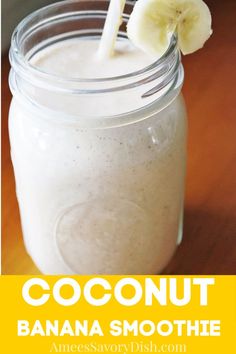 a banana smoothie in a mason jar with a straw sticking out of the top