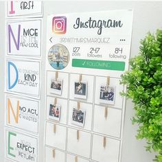 a white board with photos hanging on it