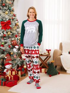 Upgrade your family pajama game with our matching outfits! Our Christmas themed sleepwear features raglan sleeves and adorable polar bear graphics with MAMA Bear, PAPA Bear or BABY Bear text. Dogs are included with their own bandana.
* Please add each size separately to your shopping cart.
* Piece of product: Each size includes 1 set of pajamas (1 top + 1 bottom), or 1 romper, or 1 pet Bandana 
* For children's safety, pajamas should be snug-fitting or flame-resistant. These kids' and babies' pajamas are flame-resistant.
* Product features: Matching family pajamas
* Fabric characteristics: Soft and comfortable
* Neckline: Round
* Sleeves: Long
* Pattern: Christmas theme with polar bears, snowflakes, and Christmas trees
* Style: Casual, Christmas, home, lounge-style
* Fit: Moderate
* Length Pants Pjs, Pattern Pants, Lounge Style, Allover Pattern, Matching Family Pajamas, Family Christmas Pajamas, Bear Graphic, Papa Bear, Polar Bears