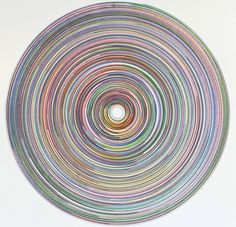 a circular painting with multicolored lines in the shape of a circle on a white background