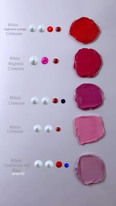 the different shades of lipstick are arranged on a white surface with red, pink, and blue