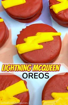 these lightning macquen oreos are made with red and yellow frosting on top