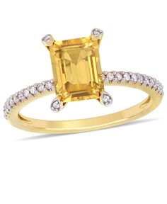 This elegant ring is crafted in 10k yellow gold and features an octagon-cut (8x6mm) citrine gemstone with 26 round-cut dazzling diamonds. This beautiful ring is enhanced with a high polish finish. Yellow Gold Engagement Ring, Yellow Gold Engagement, Yellow Gold Engagement Rings, Citrine Gemstone, Elegant Ring, 2 Carat, Gold Engagement Rings, Diamond Studs, Yellow Gold Rings