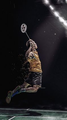 a man jumping in the air with a tennis racket