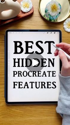 a person holding a pen in front of a tablet with the words best hidden procreate features on it