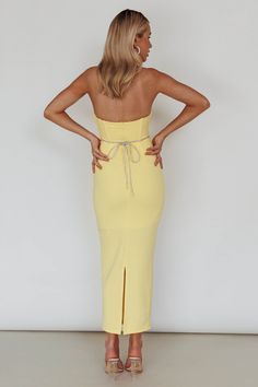 The Diamonds Midi Dress features a strapless neckline with a waist cut out and diamante strap detailing. It has a zipper in the back and is made from stretchy fabric. Runs true to size Model is 5'7" and wears a size XSMALL Center back zipper Designed in Australia Our boutique is located in Michigan USA, please visit us on instagram to see our beautiful customer's pictures. Fitted Strapless Maxi Dress With Tie Back, Fitted Bandeau Dress With Tie Back, Fitted Yellow Bandeau Dress, Yellow Strapless Dress For Date Night, Acler Dress, Yellow Bridesmaids, Yellow Midi Dress, Blue Bridesmaids, Dress Yellow