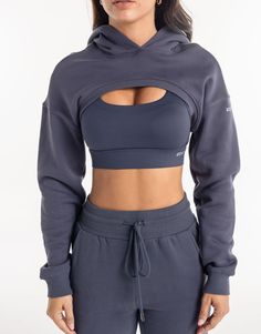 Meet the High Cut Hoodie, the perfect layering piece that deserves to be a part of the all-year rotation. The ultra cropped length is the High Cut Hoodie's best attribute, great for showing off your sportsbra and/or bikini. Add in a hoodie and you've got a top that can provide style and warmth - Super soft cotton/polyester blend - In-trend ultra cropped silhouette - Large hood - Designed to flatter every size - Worn by our inhouse team for the perfect fit 62% Cotton, 38% Polyester Bella is wearing a Small She is 170cm (5'6") tall with an 33" bust, a 25" waist and 36" hip Fitted Cropped Athleisure Hoodie, Sporty Crop Top For Layering, Stretch Cropped Activewear For Winter, Winter Streetwear Stretch Crop Top, Winter Cropped Stretch Activewear, Sporty Cropped Top For Winter, Fall Sports Crop Top, Cropped Sports Tops For Winter, Sporty Stretch Hoodie For Layering