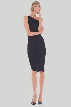 The Norma Kamali Diana Dress features a one-shoulder design with shirred sides and an asymmetrical hem for a flattering, modern look. This knee-length dress includes a built-in 4-way stretch bodysuit, providing comfort and creating a beautifully draped silhouette that hugs the body effortlessly. One shoulder Shirred sides Asymmetrical hem Knee length For easy fit and more draping choose one size higher A 4-way stretch bodysuit is built in the garment for comfort and to create the drape of this style Protective adhesive strip must remain in garment to be eligible for refund Tip: If your height is under 5'4", the longest part of the dress will fall approximately above your midcalf. 4-way stretch Poly Lycra. Composition: 95% polyester 5% spandex Norma Kamali Diana Dress, Diana Dress, Norma Kamali, Shoulder Design, Asymmetrical Hem, Turks And Caicos Islands, Knee Length Dress, Brunei, Asymmetric Hem