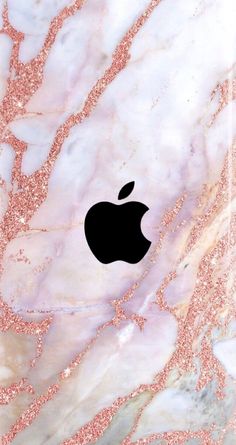 an apple logo is on the back of a marbled ipad case with pink and gold speckles