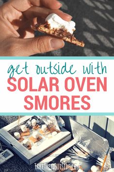 a person holding a piece of food with the words get outside with solar oven smores