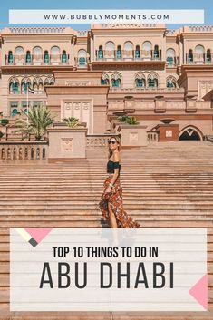 a woman sitting on steps in front of a building with the words top 10 things to do